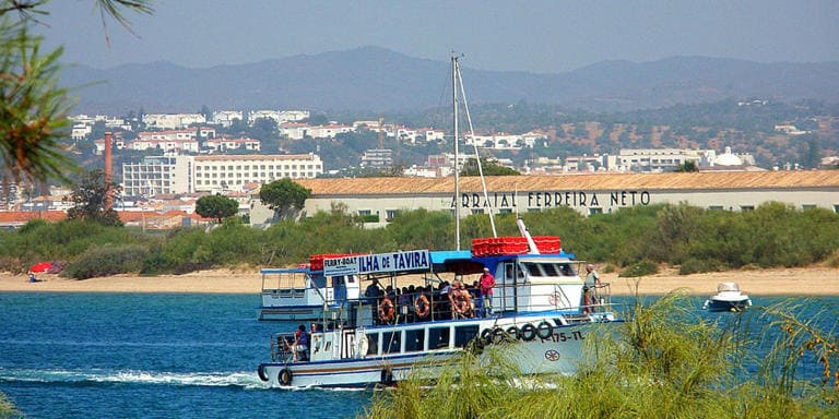 Cabanas de Tavira, Portugal - Travelers enjoying a Portuguese boat trip
